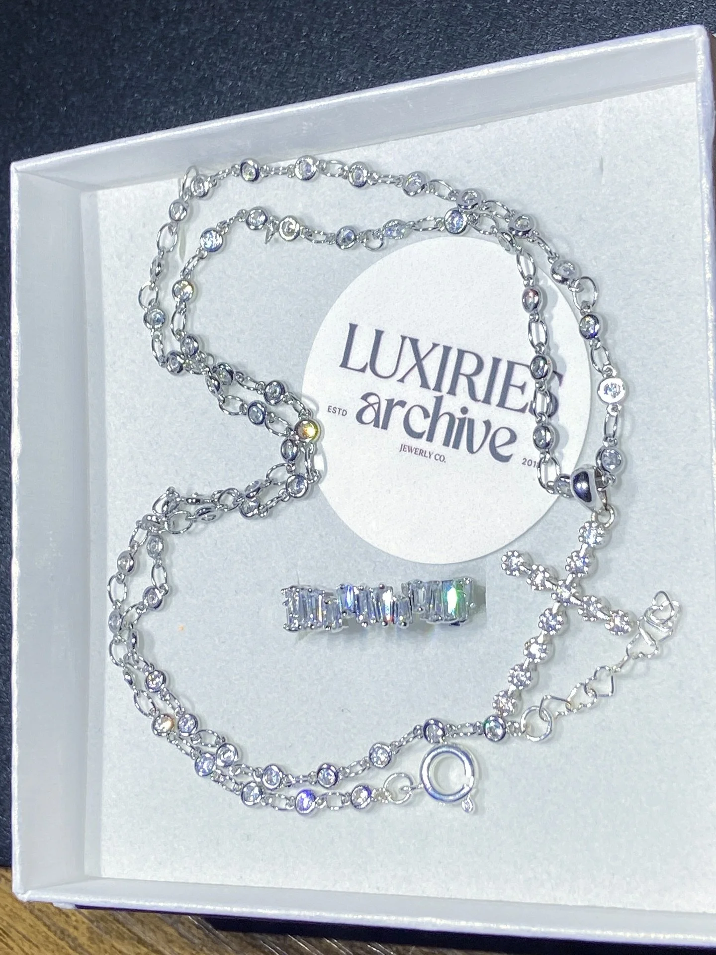 a blinding love; that lasts.

The Joli Fleur Cross Pendant &amp; Iced Baguette Band is Valentine&rsquo;s done right &mdash; handcrafted luxury, faith-forward, and effortlessly icy.

Say it with something that shines longer than February. ✨
🎁 Premium