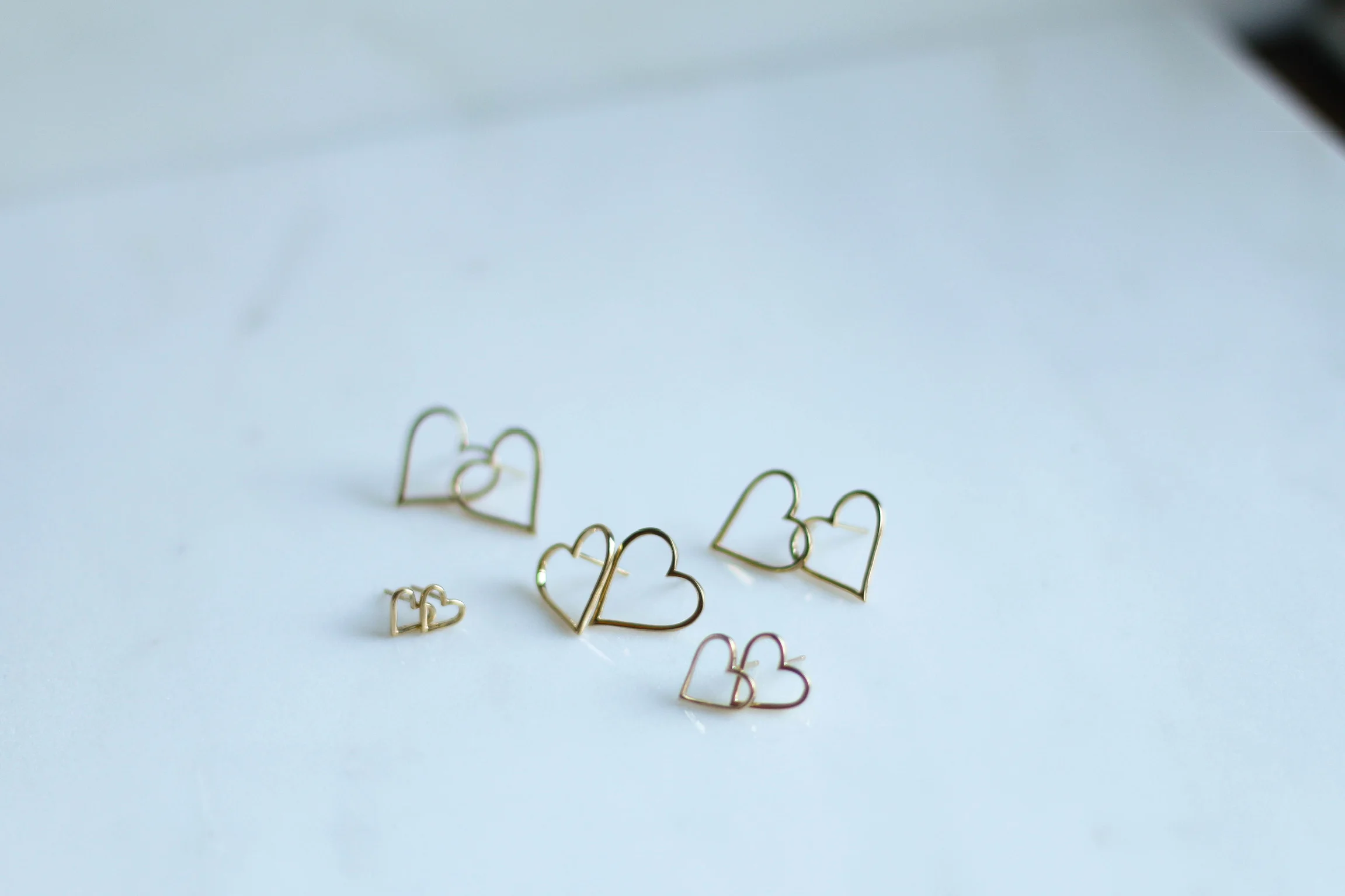 MEDIUM Carried Heart Studs 