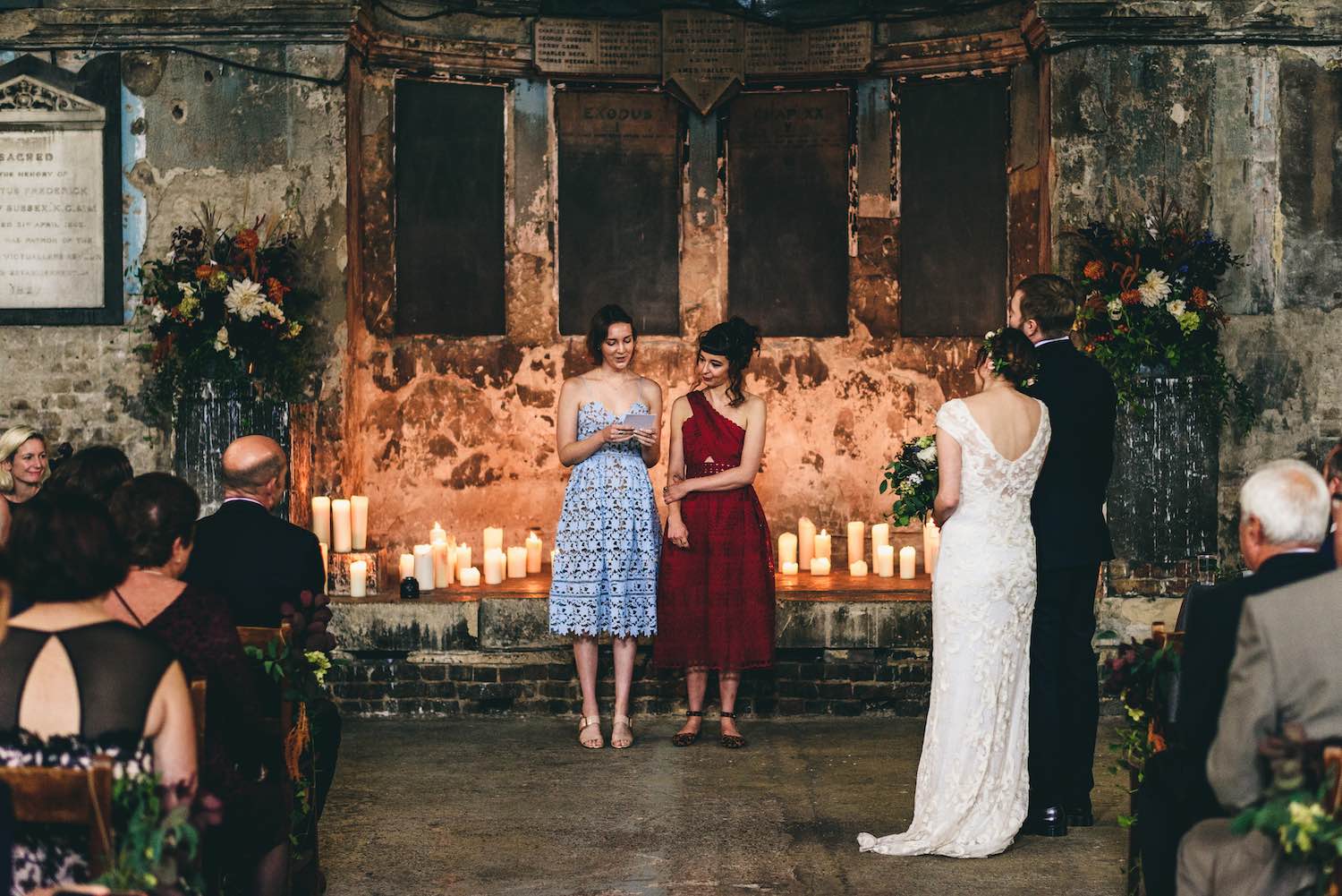 Bridesmaids speaking in wedding ceremony at Asylum chapel