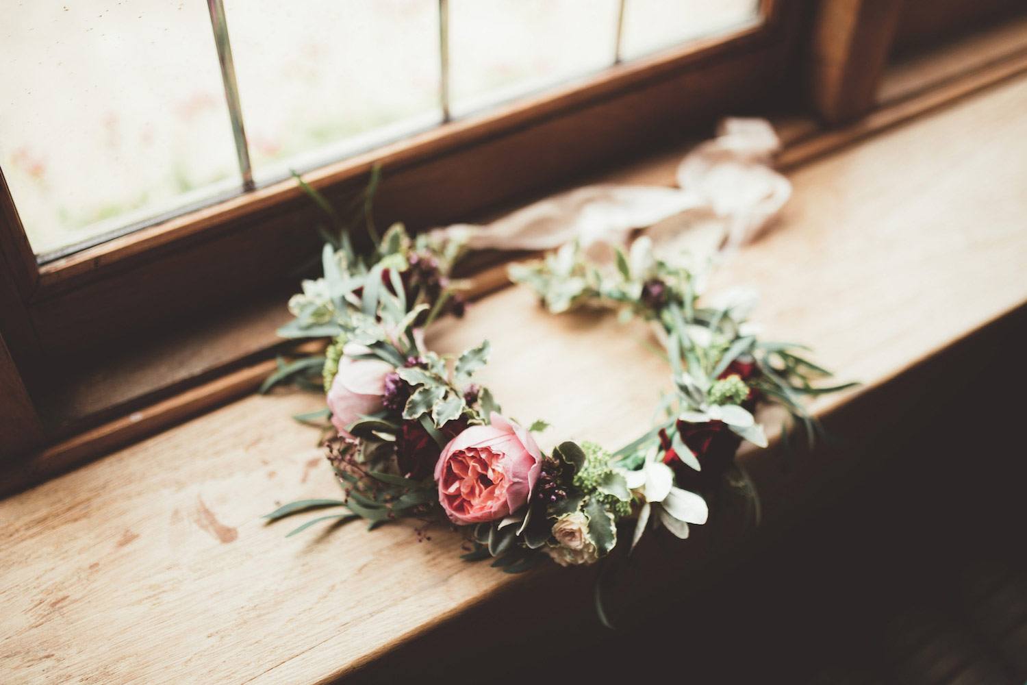 Natural rose flower crown on window sill