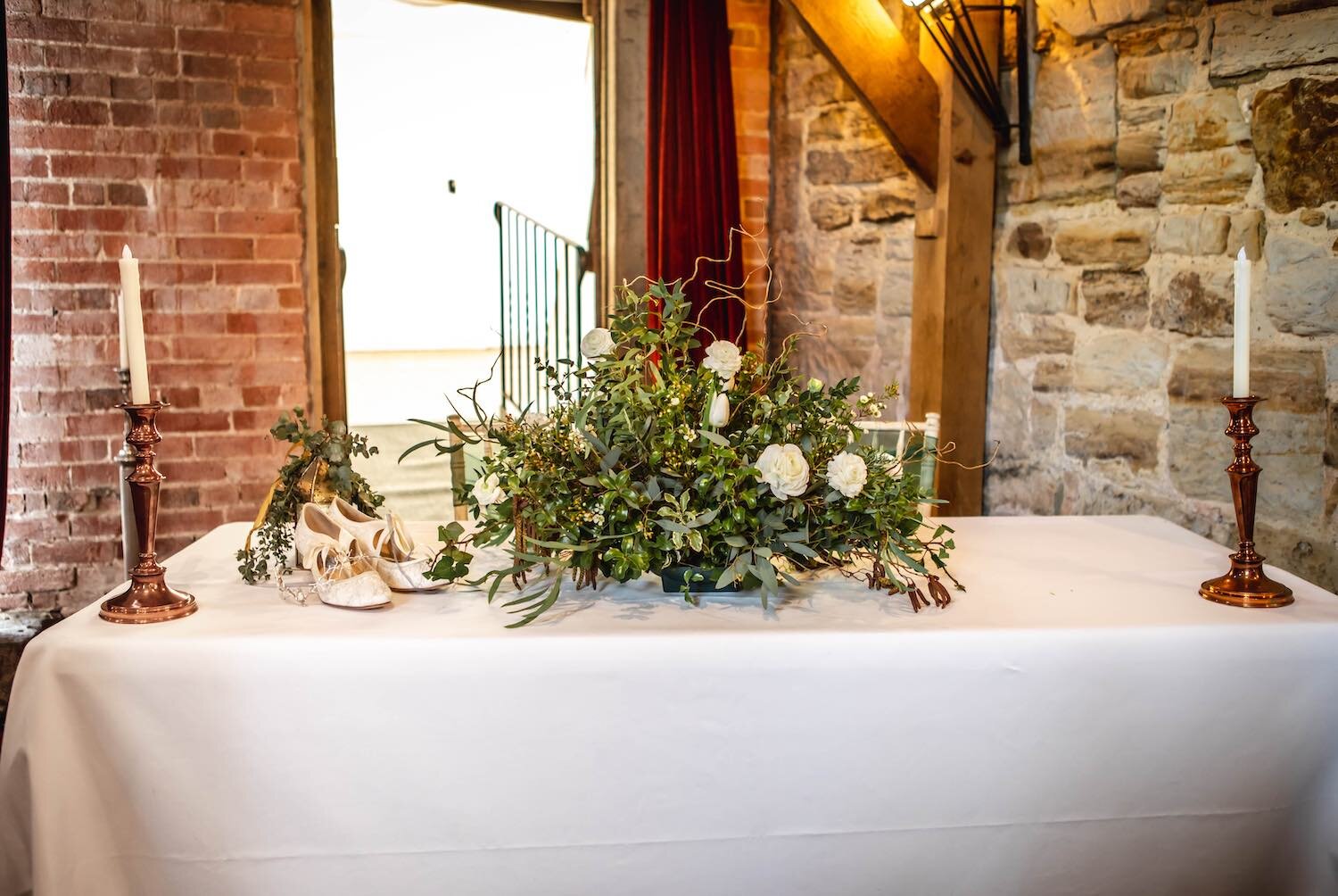 Winter wedding top table flowers