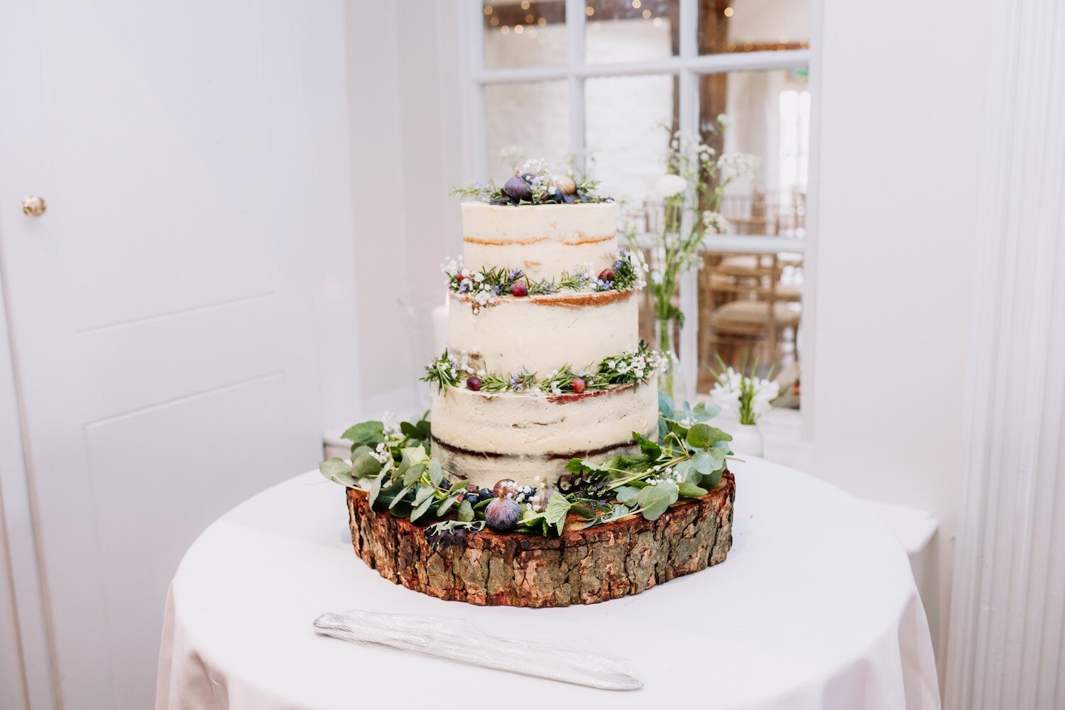 Wedding cake with flowers and berries