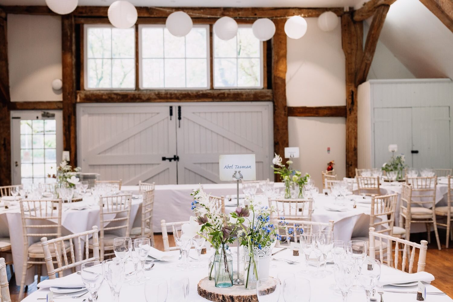 Table centrepieces barn wedding