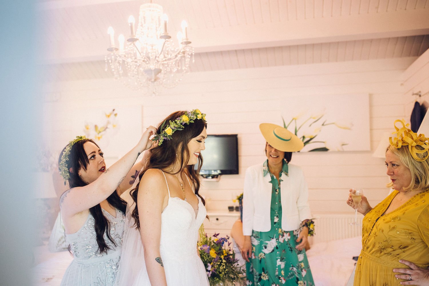 Bridesmaids and bride getting ready