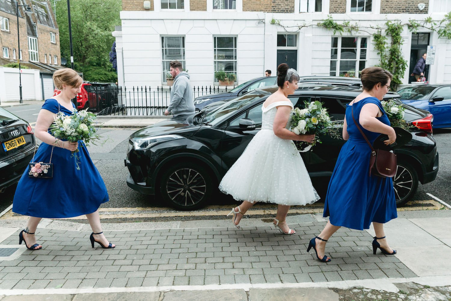 City bridesmaids in blue dress