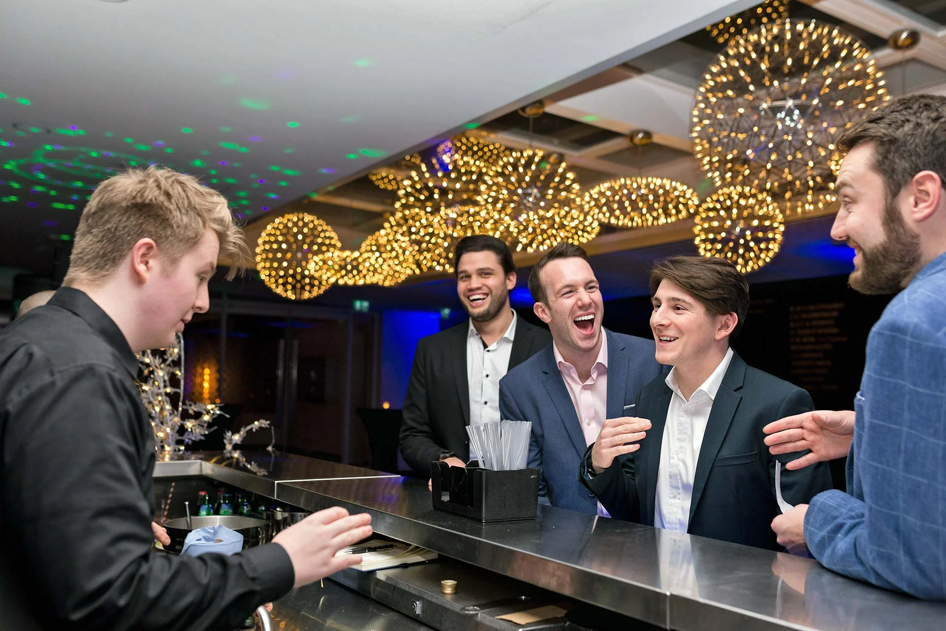 Laughing at the Bar by Brendan Foster Photography