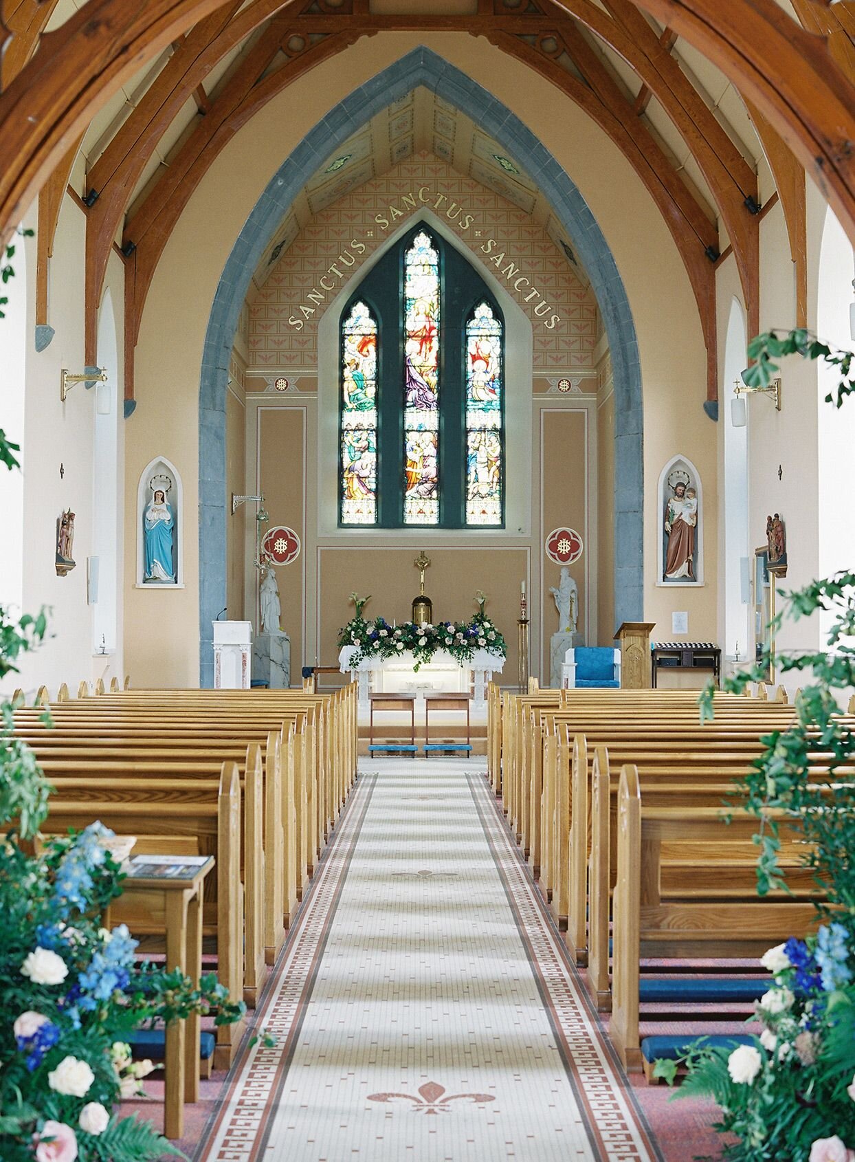 Wedding flower display inside chapel - Floralearth Wedding Florist