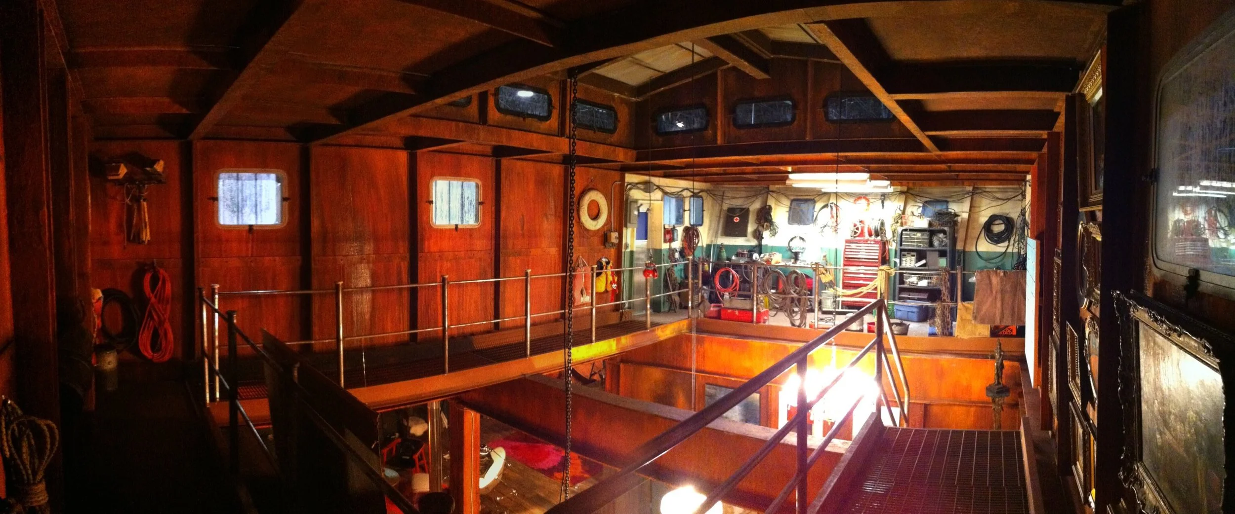 Backstrom. Backstrom's place in the hull of a river barge. Stage Set.