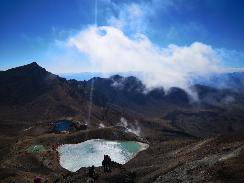 Another shot of the Tongariro Crossing. Be sure to do it on a good day so you get the views! FYI, the couple embracing at the bottom of the picture just got engaged! I walked past just as he popped the question. Not a bad place to do it!