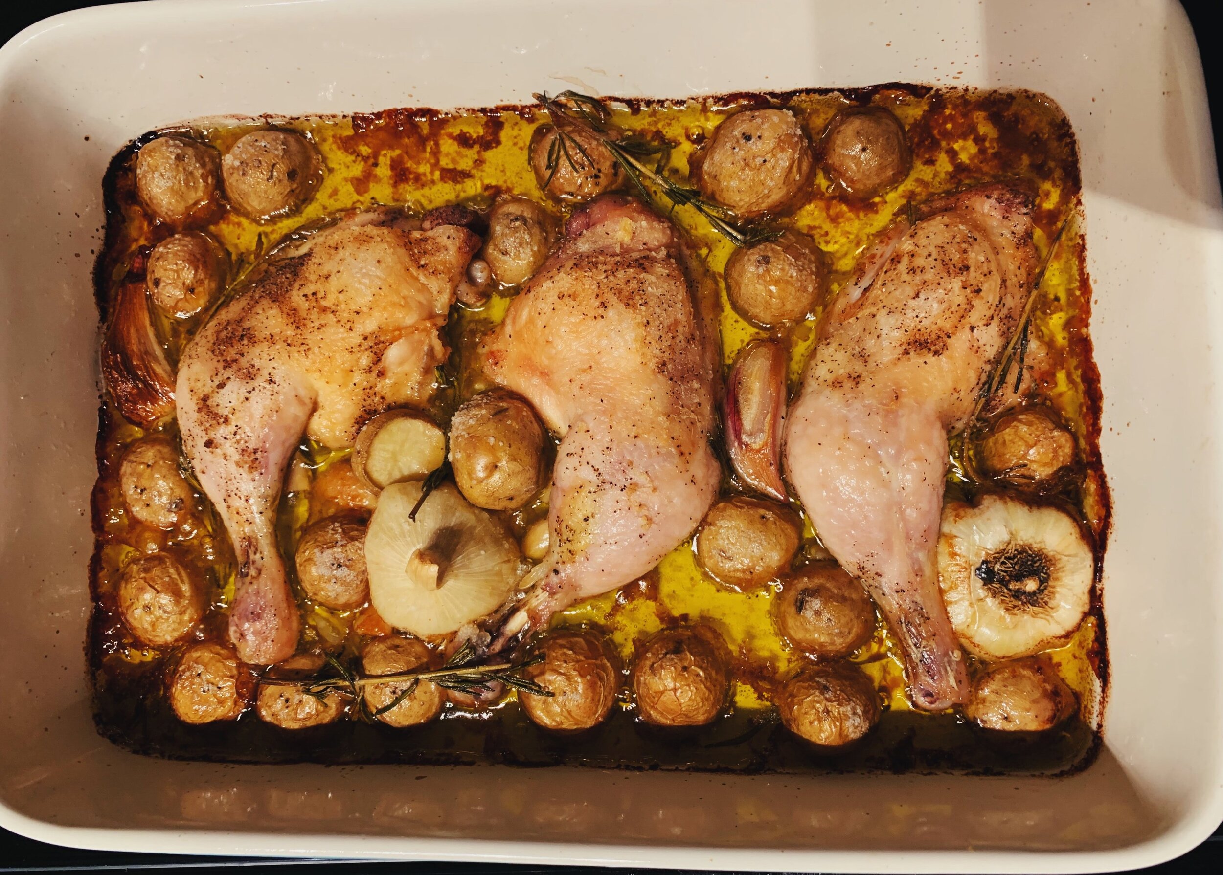 crispy-chicken-rosemary-potatoes-alison-roman-cooked-pan.jpg