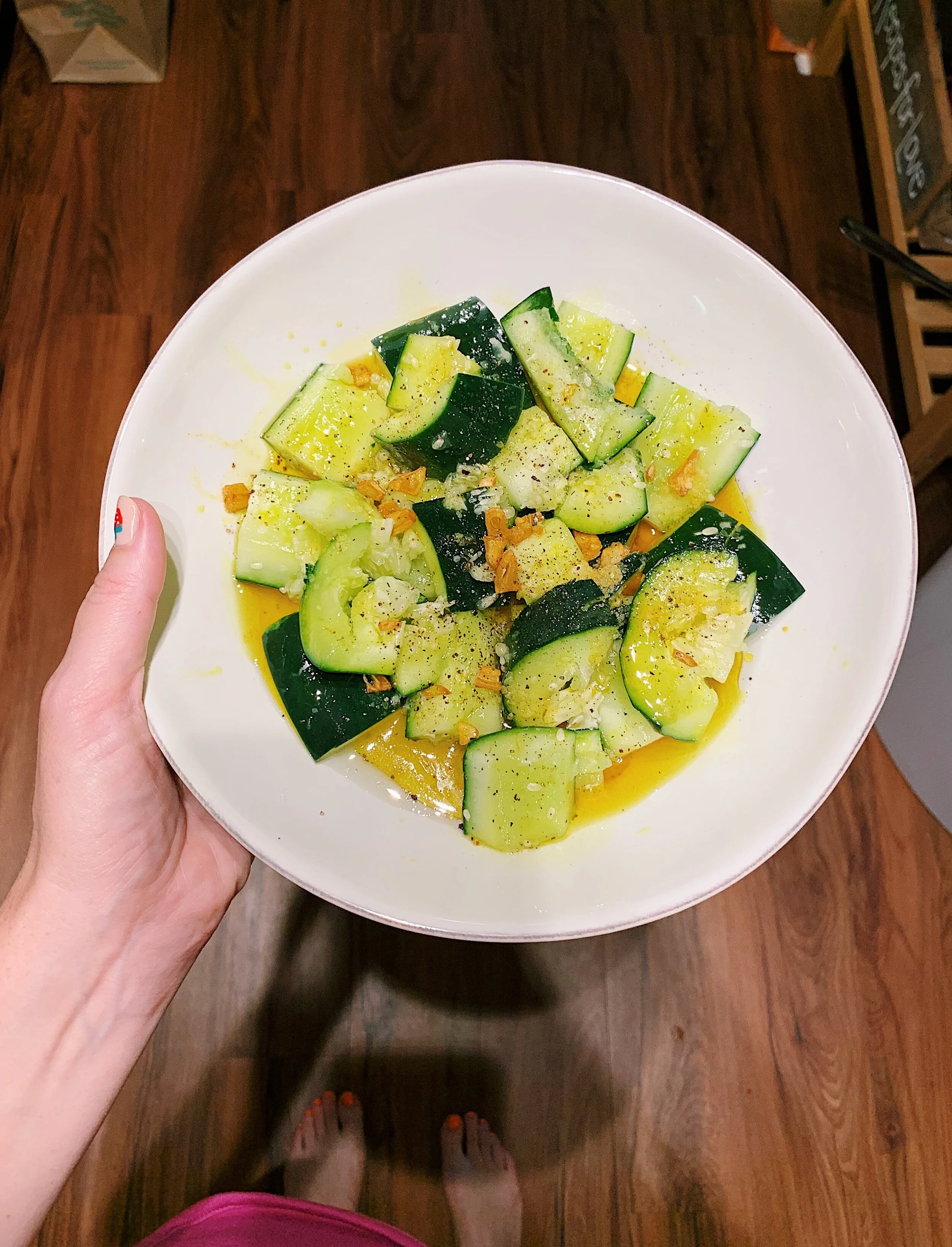 Smashed Cucumbers with Sizzled Turmeric and Garlic by Alison Roman