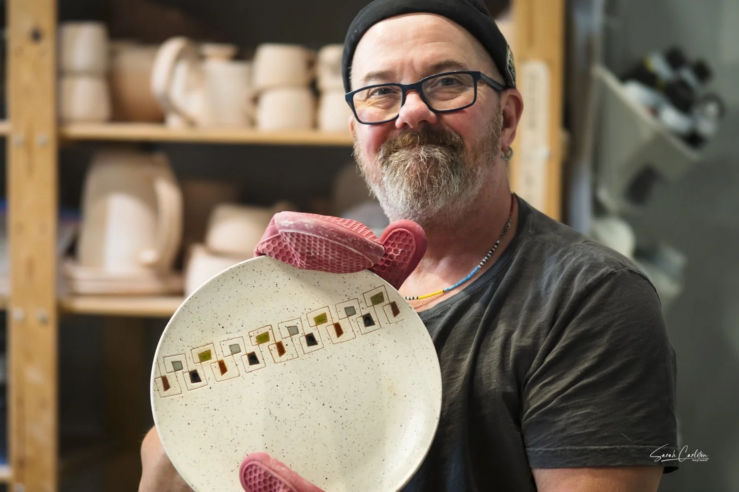 Mark holding a plate.