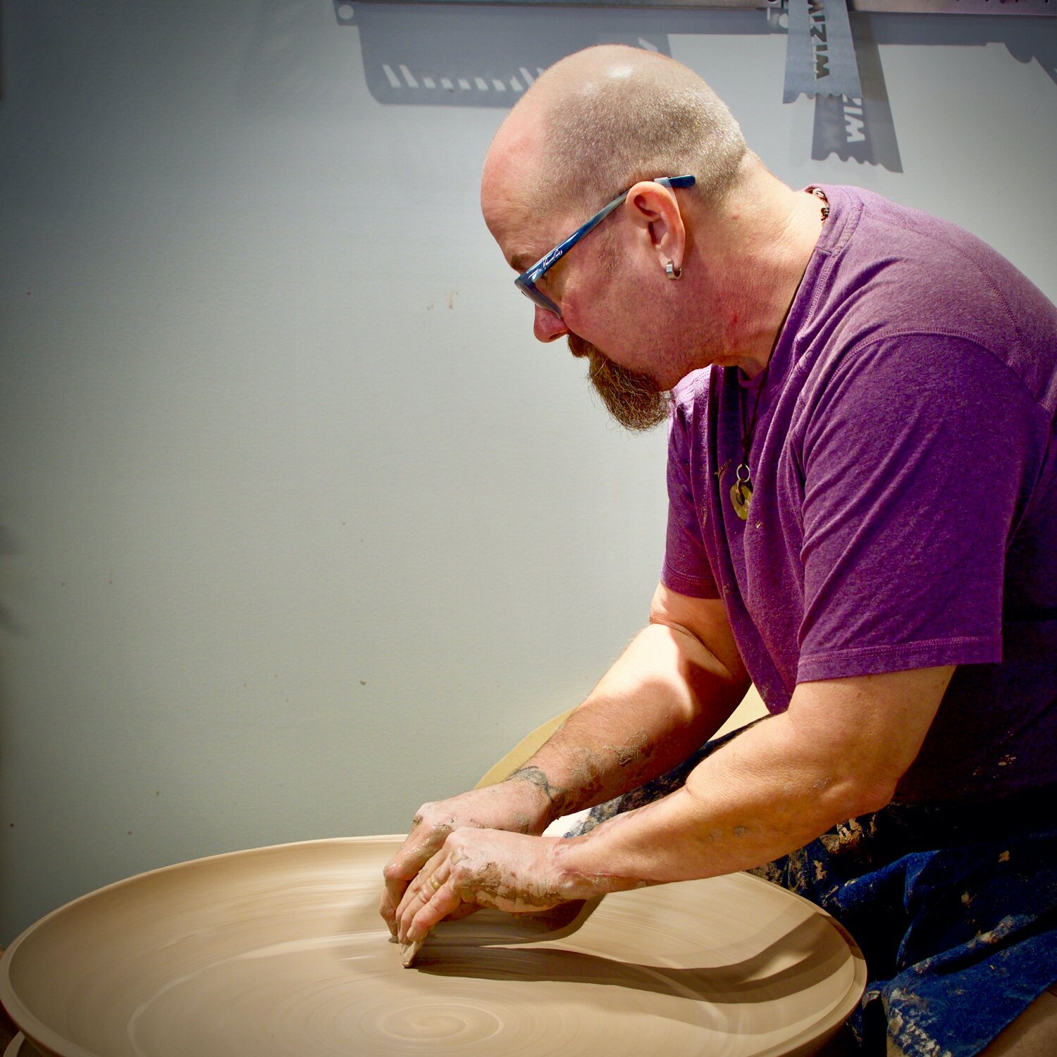 Mark throwing a large piece