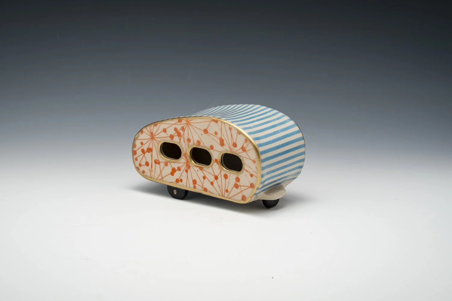 Ceramic camper trailer.