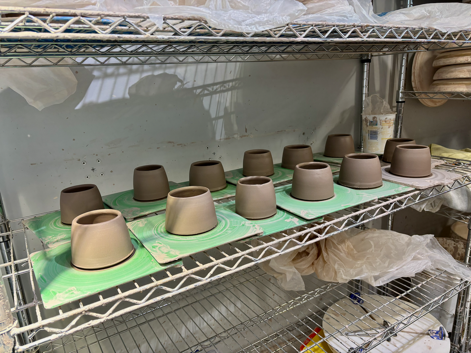 Cups drying on a rack.