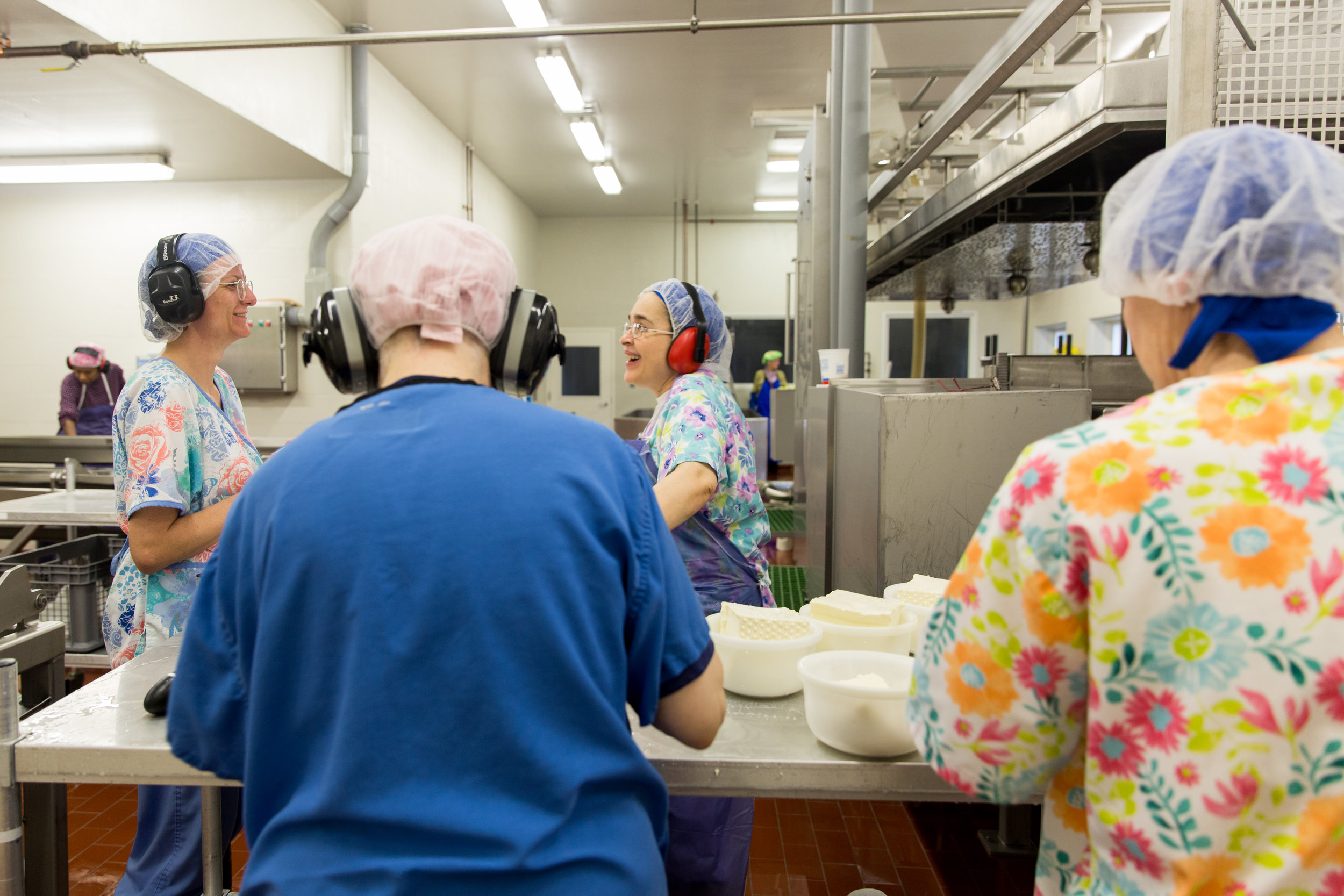  The sisters squeeze water from the gouda cheese before weighing Thursday morning on March 21, 2019 in Crozet, Virginia. Thursday is cheese making day at the monastery and cheese process takes about 6-8 hours from start to finish. 