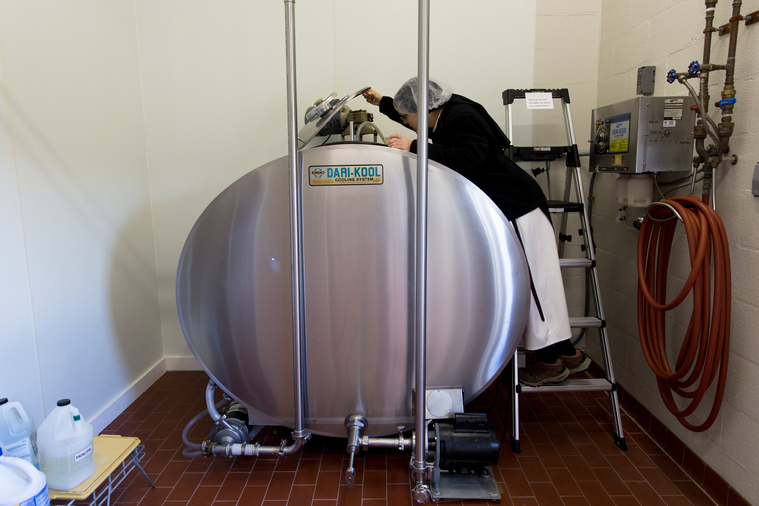  Sister Maria checks on the empty milk tank before delivery March 4, 2019 in Crozet, Virginia. "We get our milk delivered regularly and locally. We like to know where everything is coming from and exactly what gets put in," Maria said. 