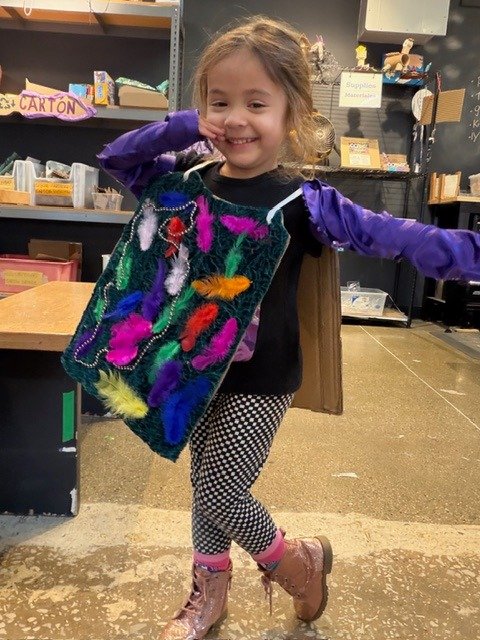 Earlier this month, we had a parent reach out after their child accidentally left behind the shirt she made in the Tinkering Lab as part of our Ready to Wear programming. Luckily, we were able to work with them to get this colorful, fun item she made
