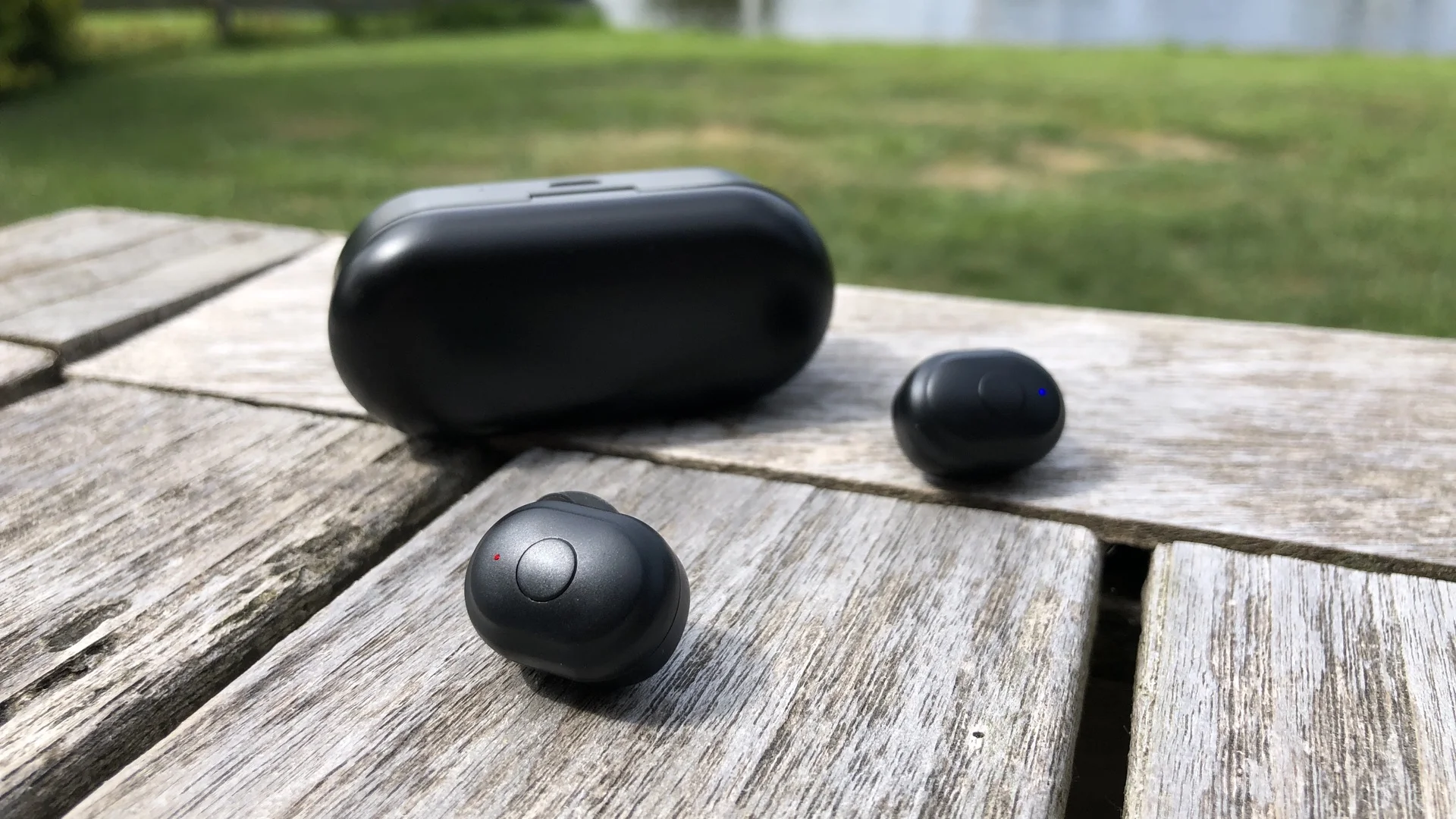 The Ausdom TW01 has real buttons, still they don't push too deep in your ear