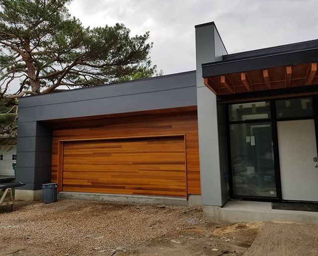 @greatnortherndoorcompany did a great job on this huge double car garage door! No filter on this photo because the marine grade finish really pulls all the color out of the cedar.