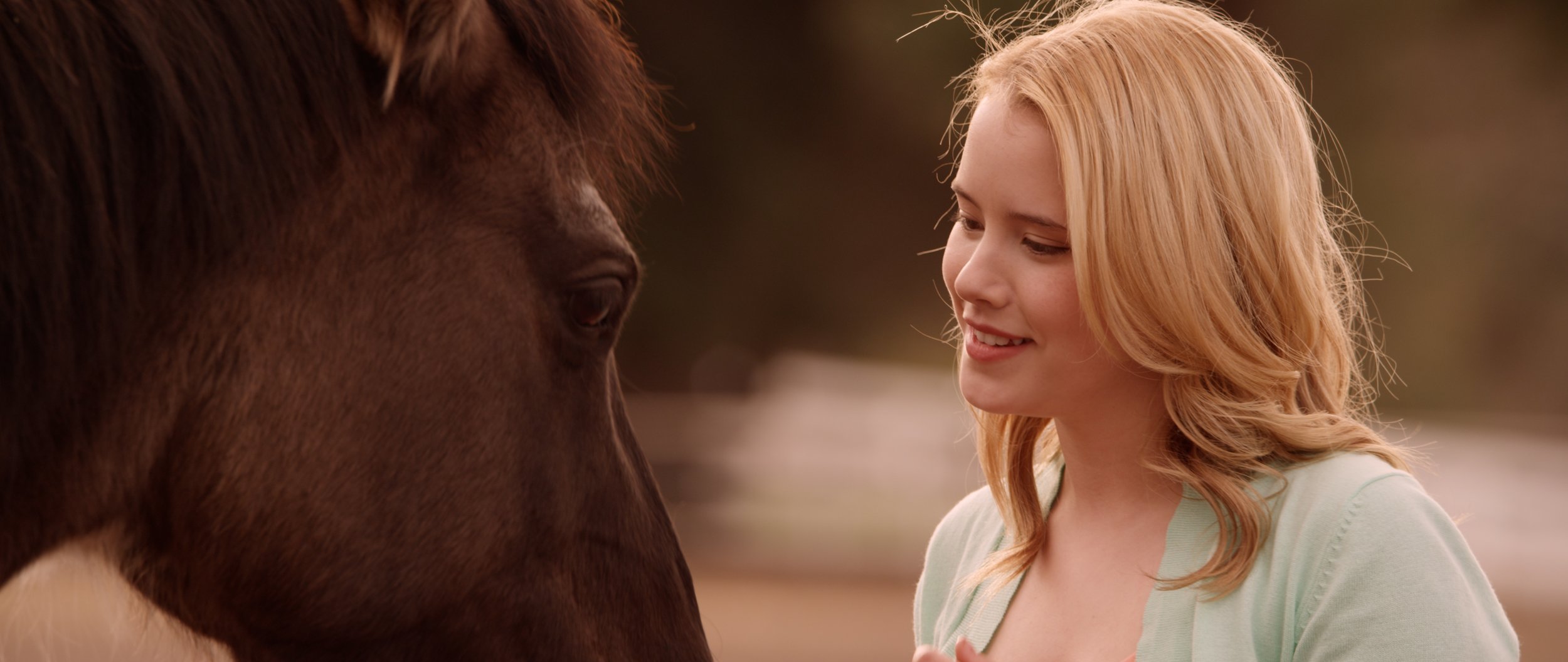 Hannah says goodbye to horse Betsy at Maheo.jpg