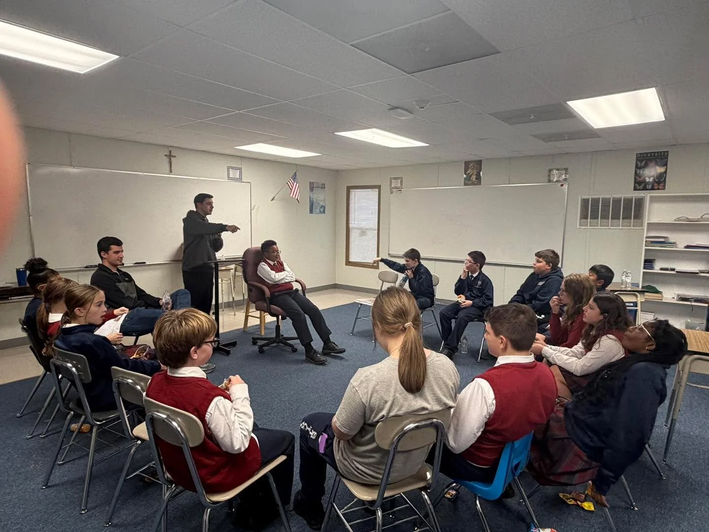 Yesterday our college students, Fr. Piro and Campus Minister Kari met with the students of Saint Michael&rsquo;s for their monthly Big Brother/Big Sister in Faith Club. The students played a fun game, learned about the word &ldquo;Eucharist&rdquo; me