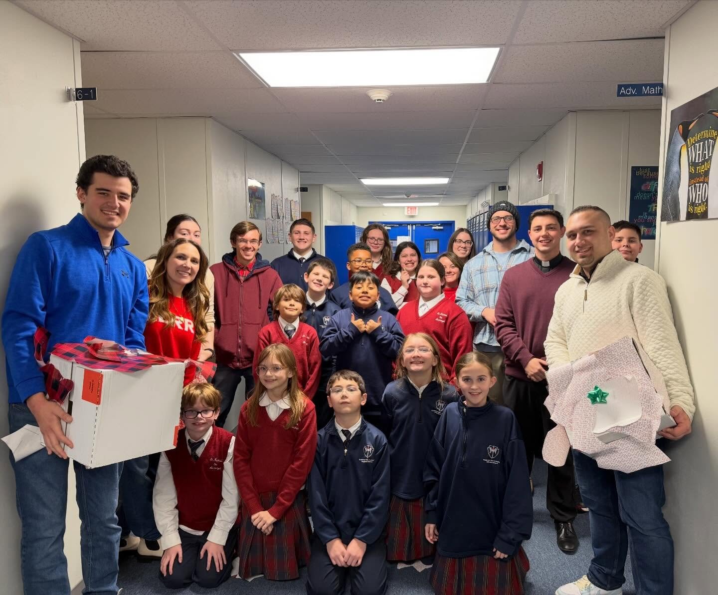 Yesterday our St. Michael the Archangel Regional School Big Brother/Big Sisters group met. We had our Advent prayer service led by Fr. Piro and the students, followed by a Christmas wrap relay race and ending with snacks and ornament making! It was a