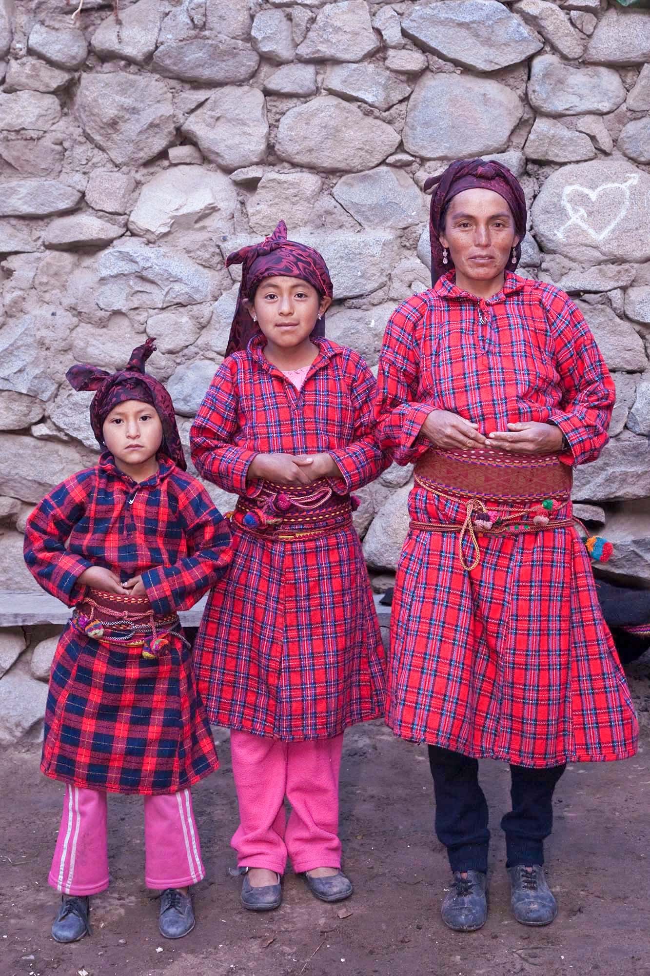  Chuquispuma-Acevedo family.  Getting ready for school!    The  qumpishi  is a thick belt worn inside of a belt called  wak’a .  The  qumpishi   is made of a coarse thread and thin rope.  It is decorated with native  designs. Women wear this belt to 