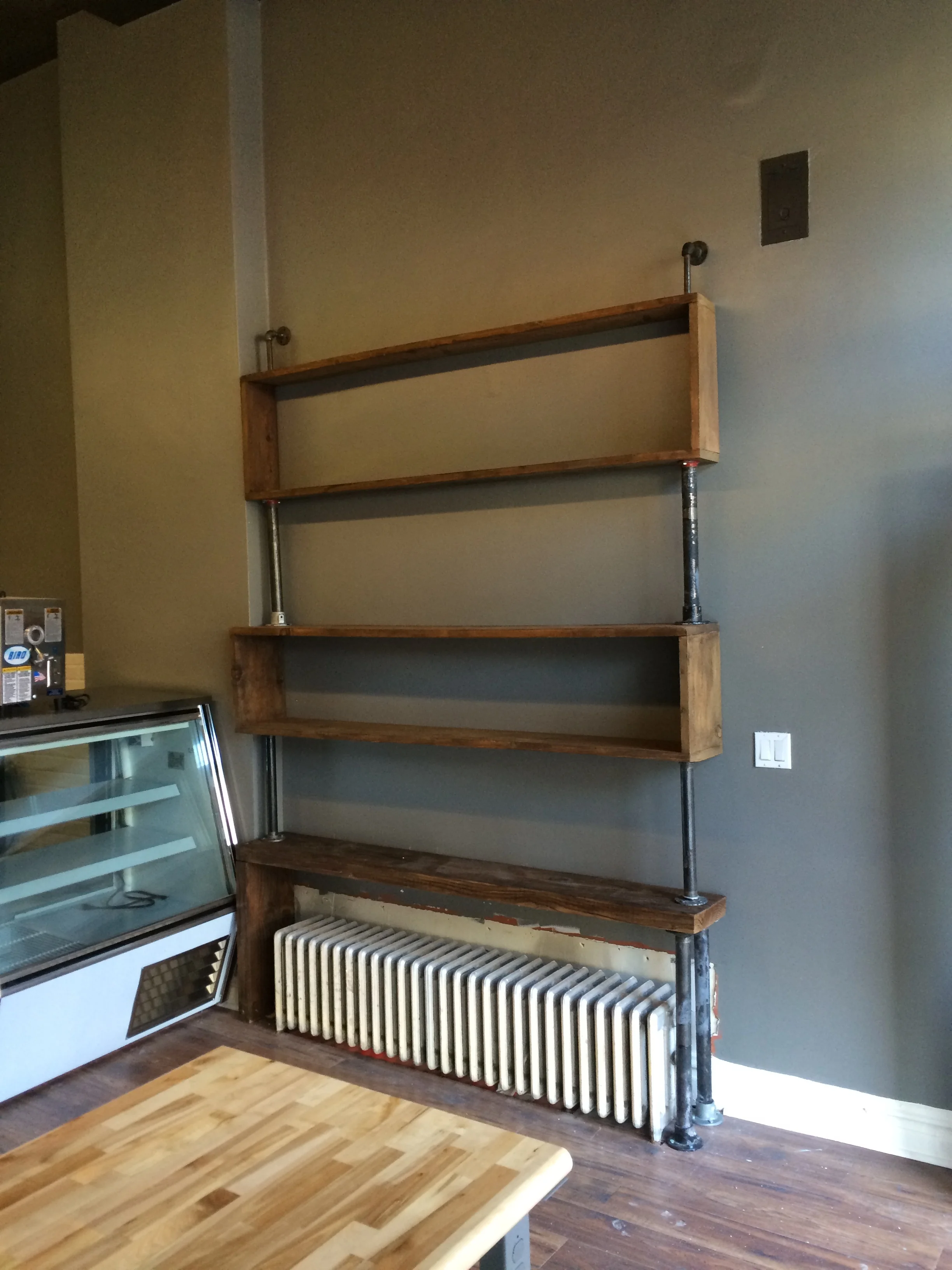 Display Shelves (refurbished joists and steel pipes)