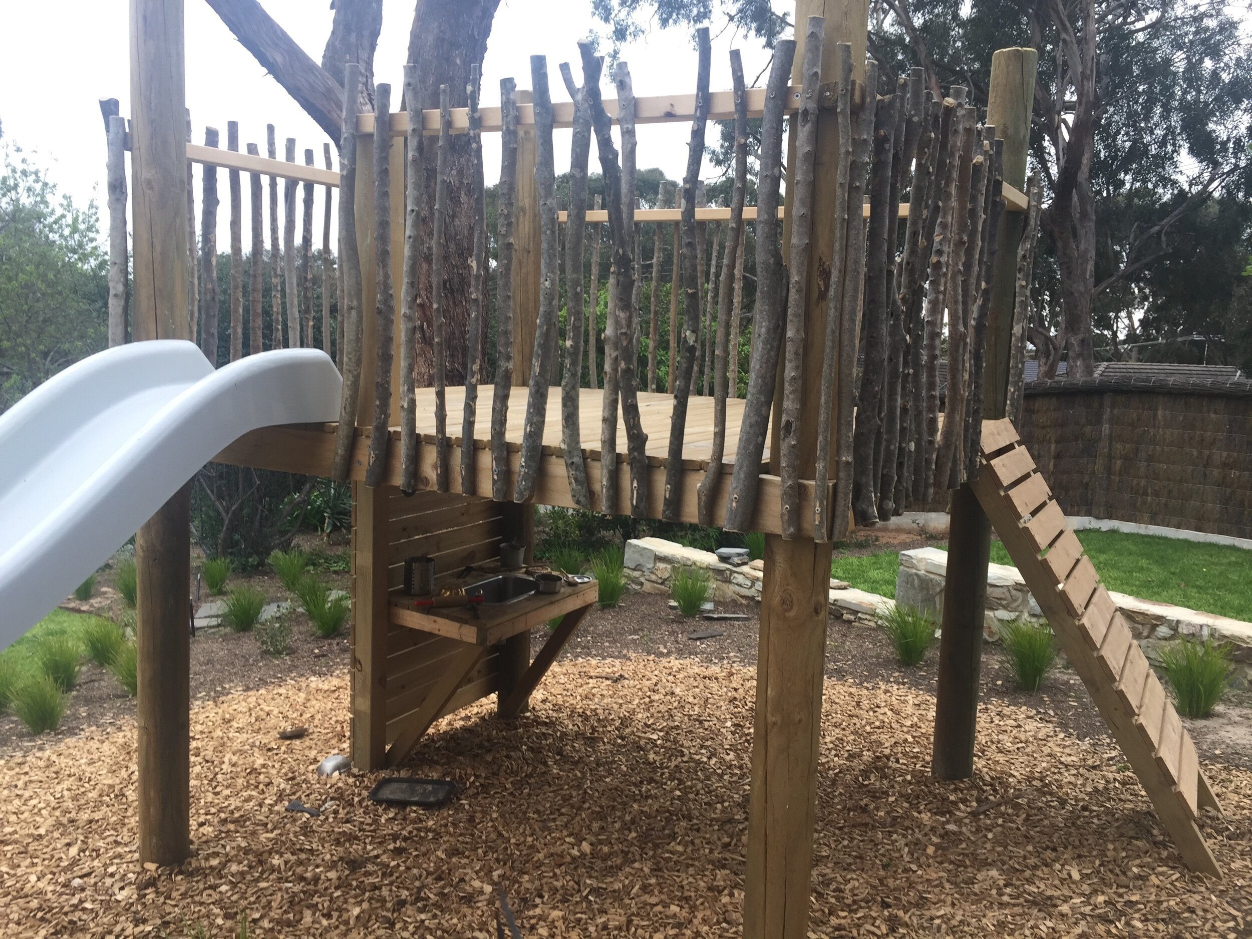 close up of kids fort & mud kitchen.jpg