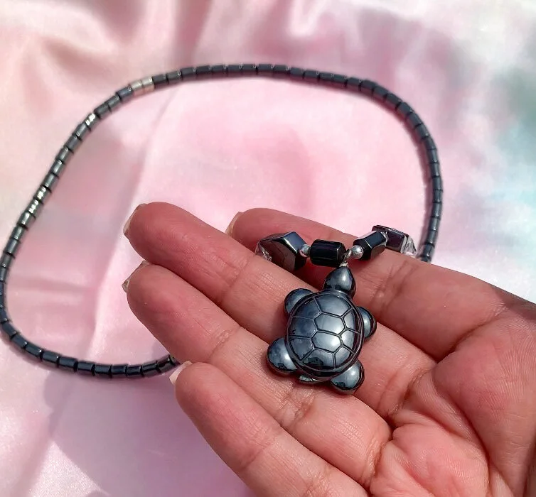 one of a kind hematite necklace shaped like a turtle