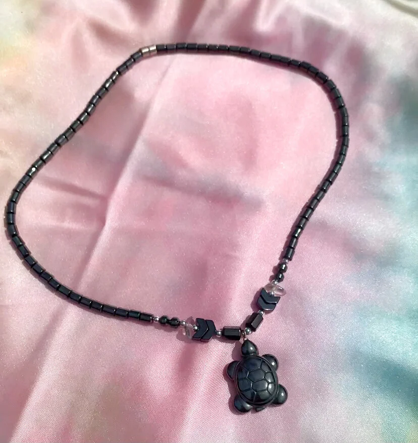 one of a kind hematite necklace shaped like a turtle