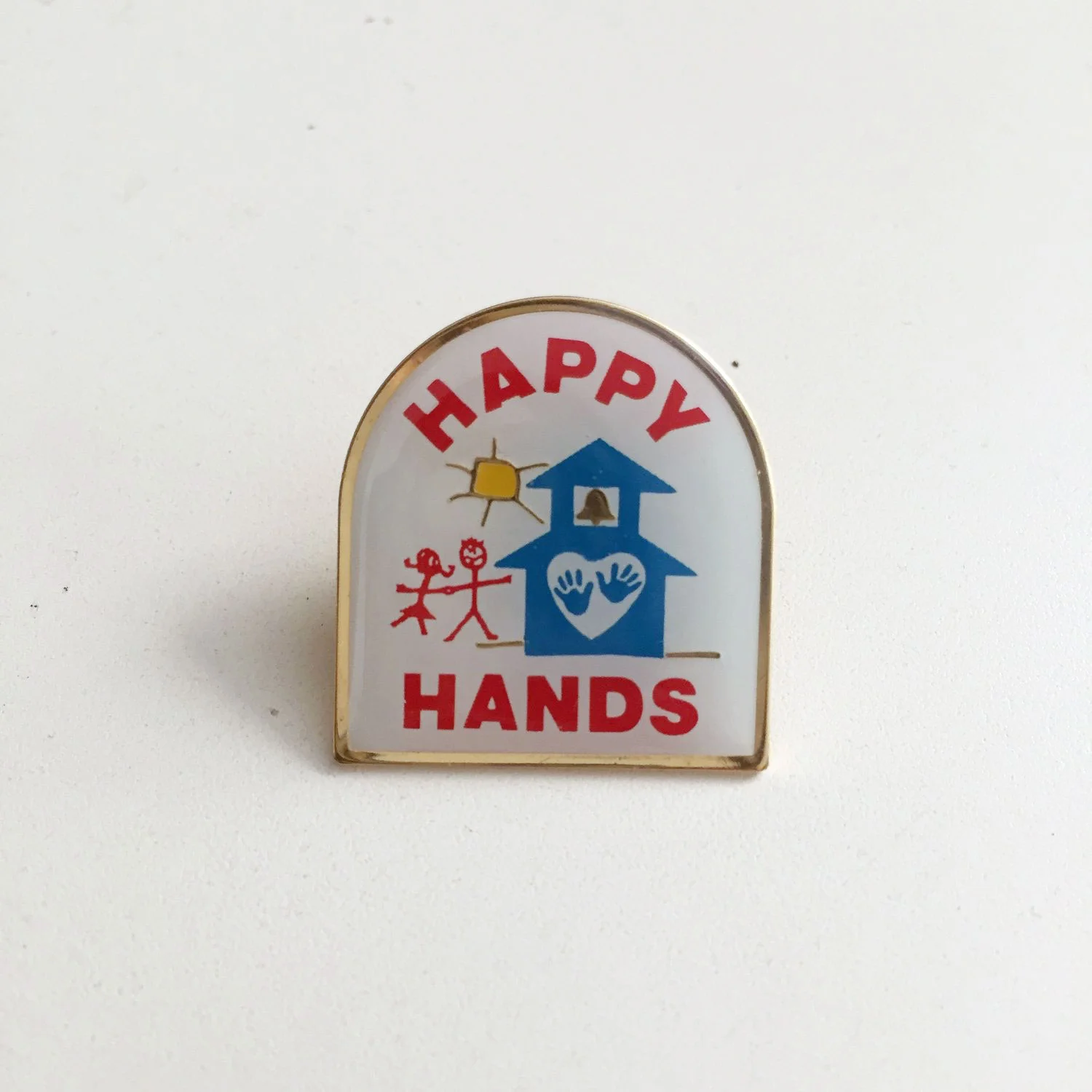 HappyHandsEnamelPin.jpg