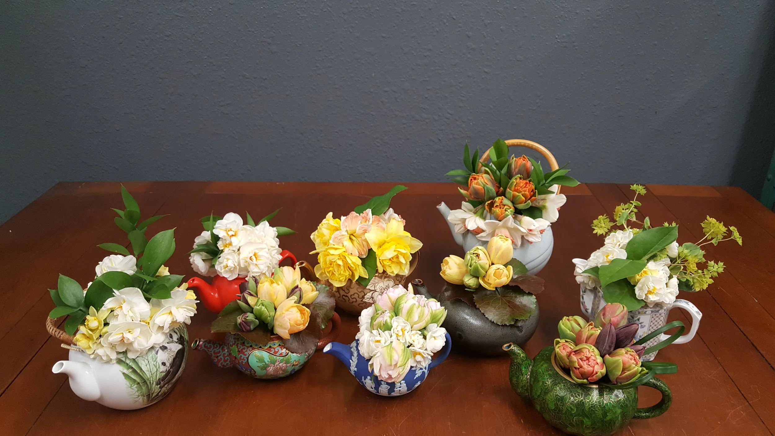 Whimsical flower arrangements designed for a tea party. All flowers were grown on the florist’s flower farm.