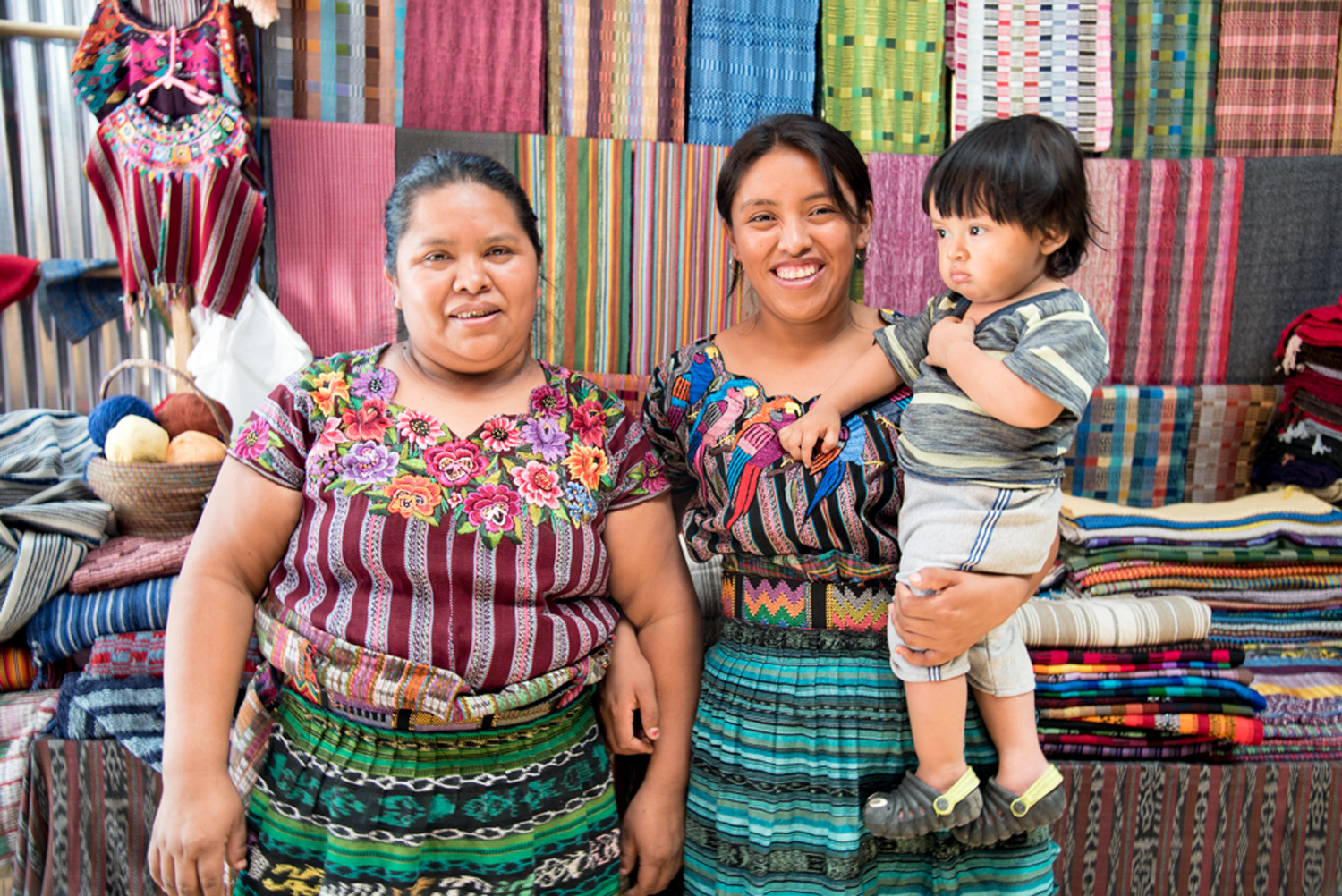 Above: Ingrid, middle, with her mother, Victoria, and her three-year-old son, Yeshua.