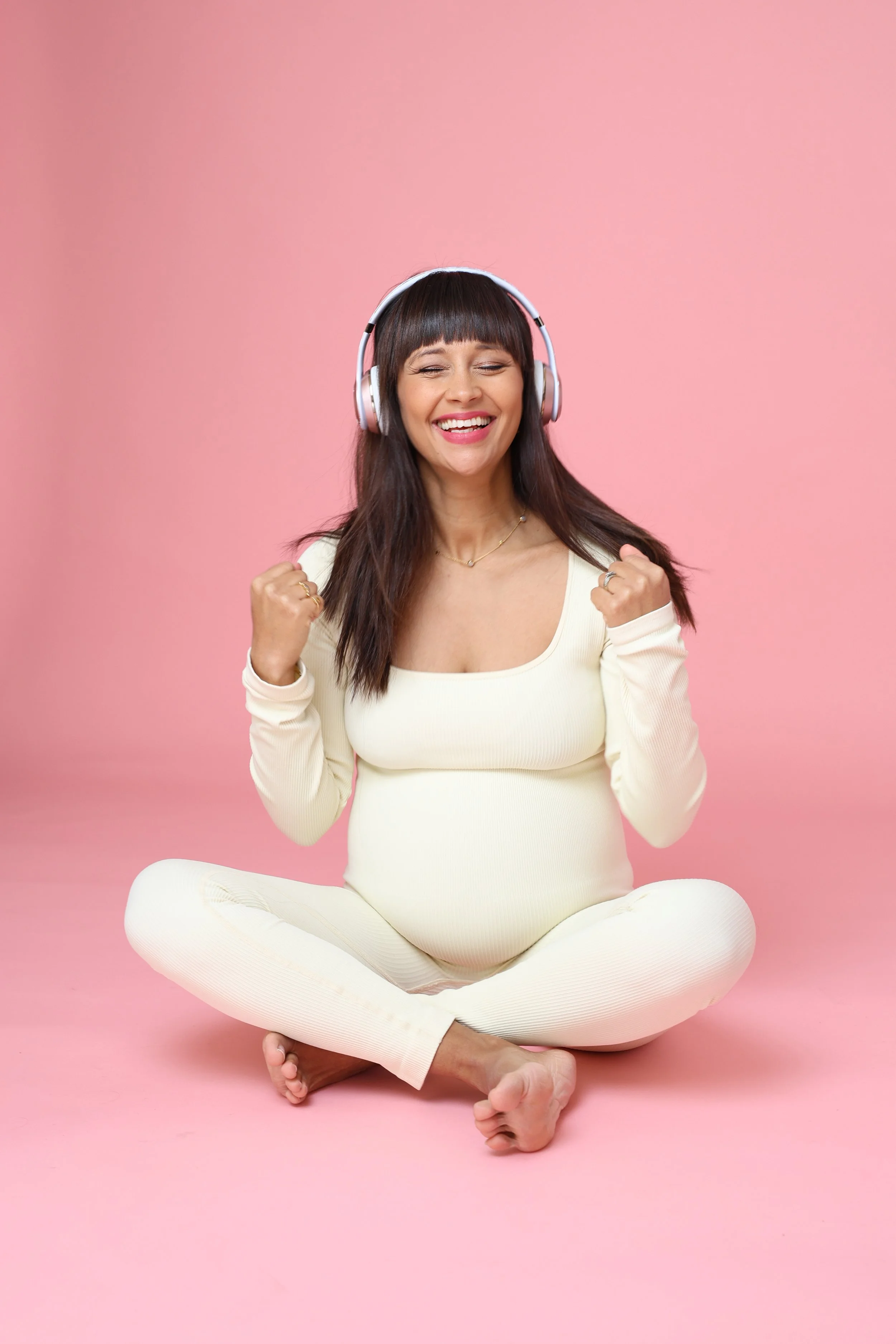 Personal branding photography London showing joyful and expressive female entrepreneur during photoshoot