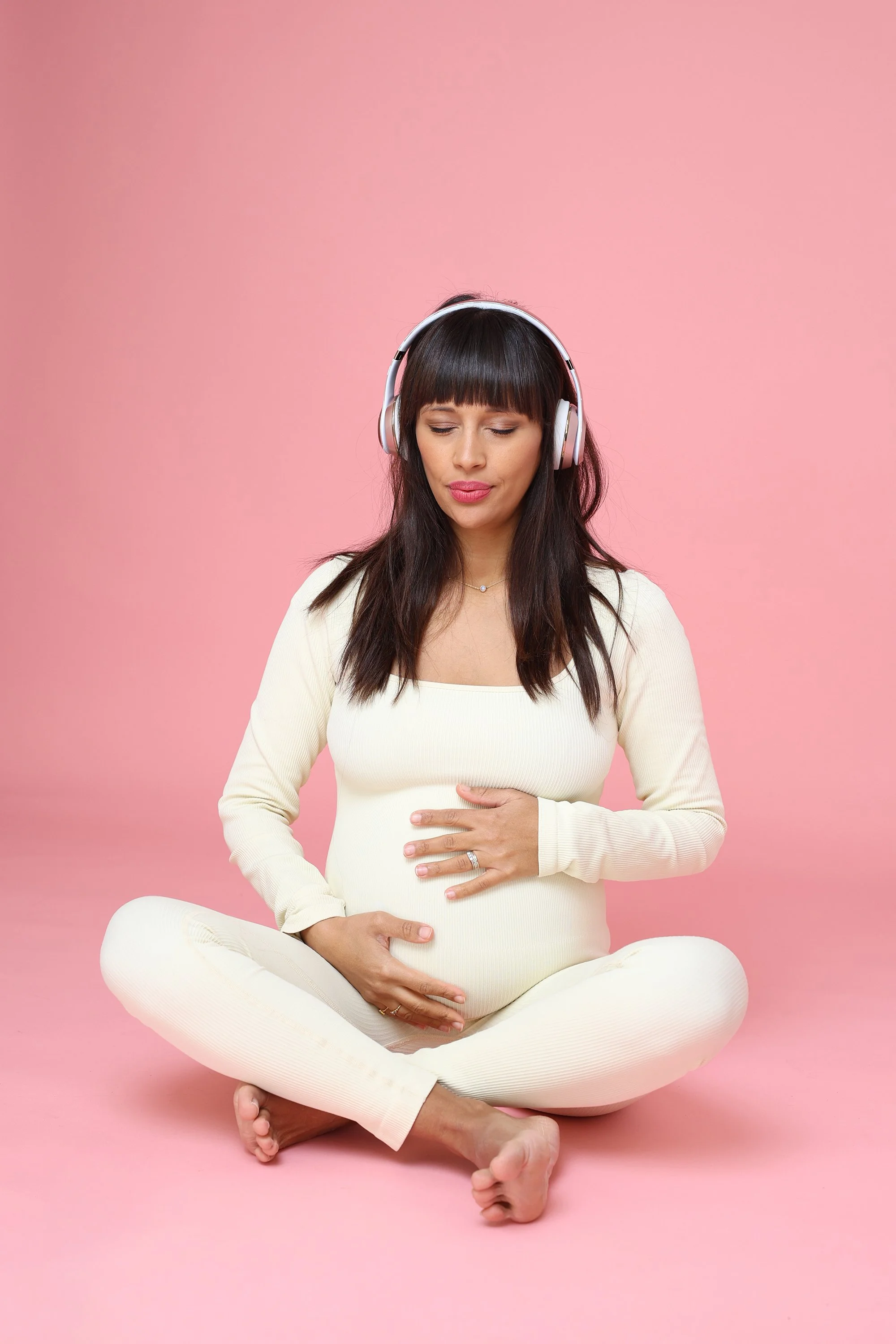Personal branding photography London session with female client in calm and reflective seated pose