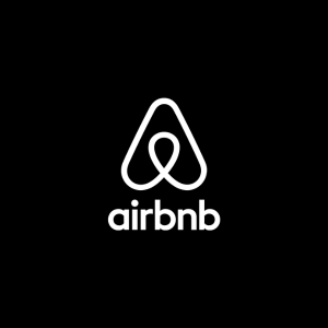 Airbnb logo on a black background