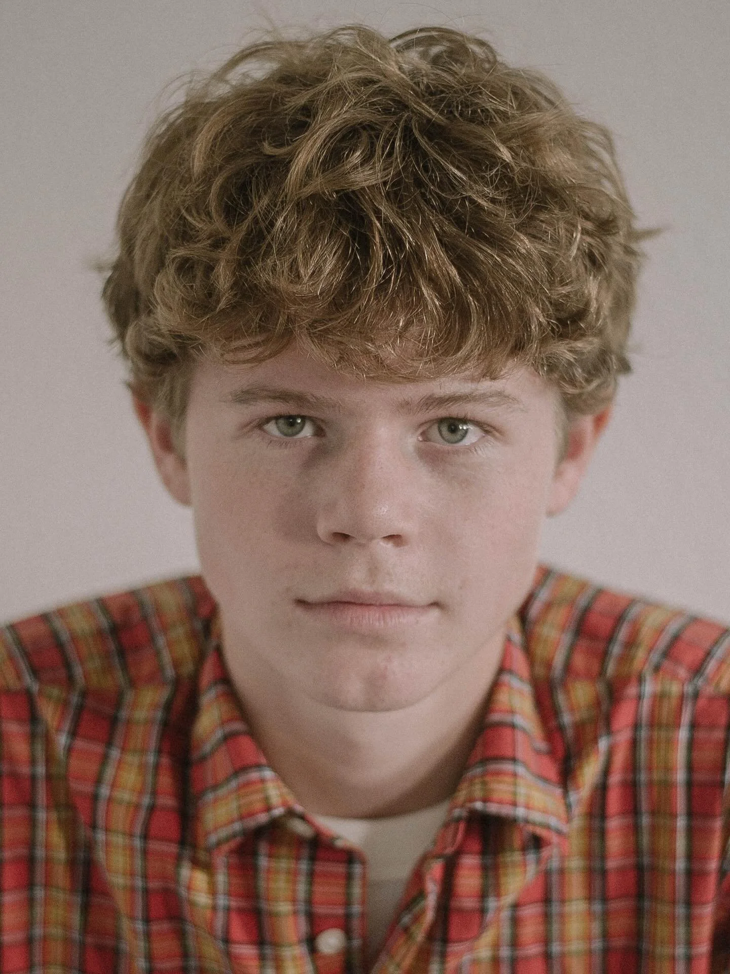 The second slide is a recording of Henry reciting Invictus when he was 10, overlayed onto his portrait taken when he was 15 years old.