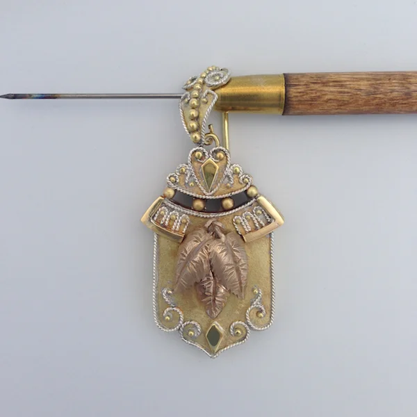 Here is the pendant before we sent it out for plating. Next step was to ship the design to be plated in two tone gold..