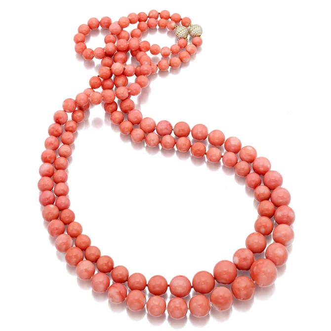 Necklaces in 18k yellow gold with 7 mm–17 mm angel skin coral beads and 1 ct. t.w. diamonds (each), prices on request; Assael