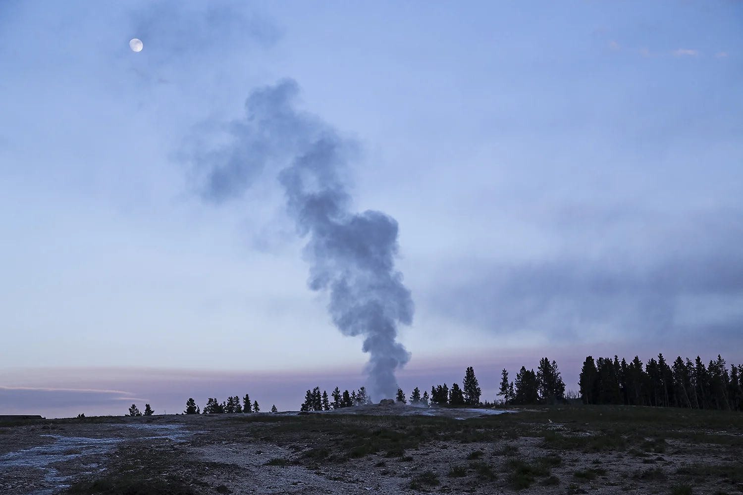 Old Faithful at sunset