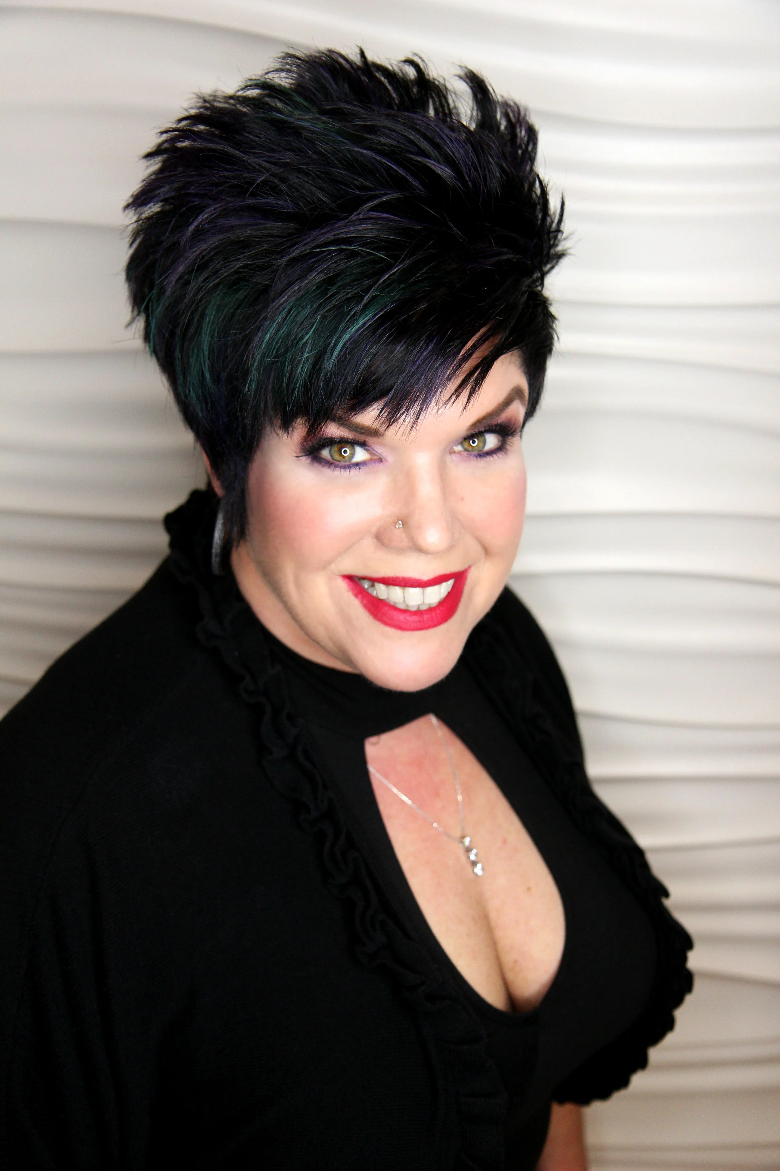 Rachael Burroughs, Nail Artist Rachael graduated in 1990 with her Nail Technician License at the top of her class. Rachael is certified in CND Shellac, OPI Gel Color, Backscratchers Fiberglass and Silk Wraps, LeChat Gel Nail Enhancements and reflexology . She is also a certified OPI and Tammy Taylor Acrylic Educator. Every pedicure features a Jetless Pedicure Throne, insuring the ultimate in cleanliness for your health, peace of mind and ultimate relaxation. We feature a full line of OPI Polish , Shellac and Vinylux . In her free time, Rachael enjoys reading, cooking, time with my family and any chance to be in the pool.