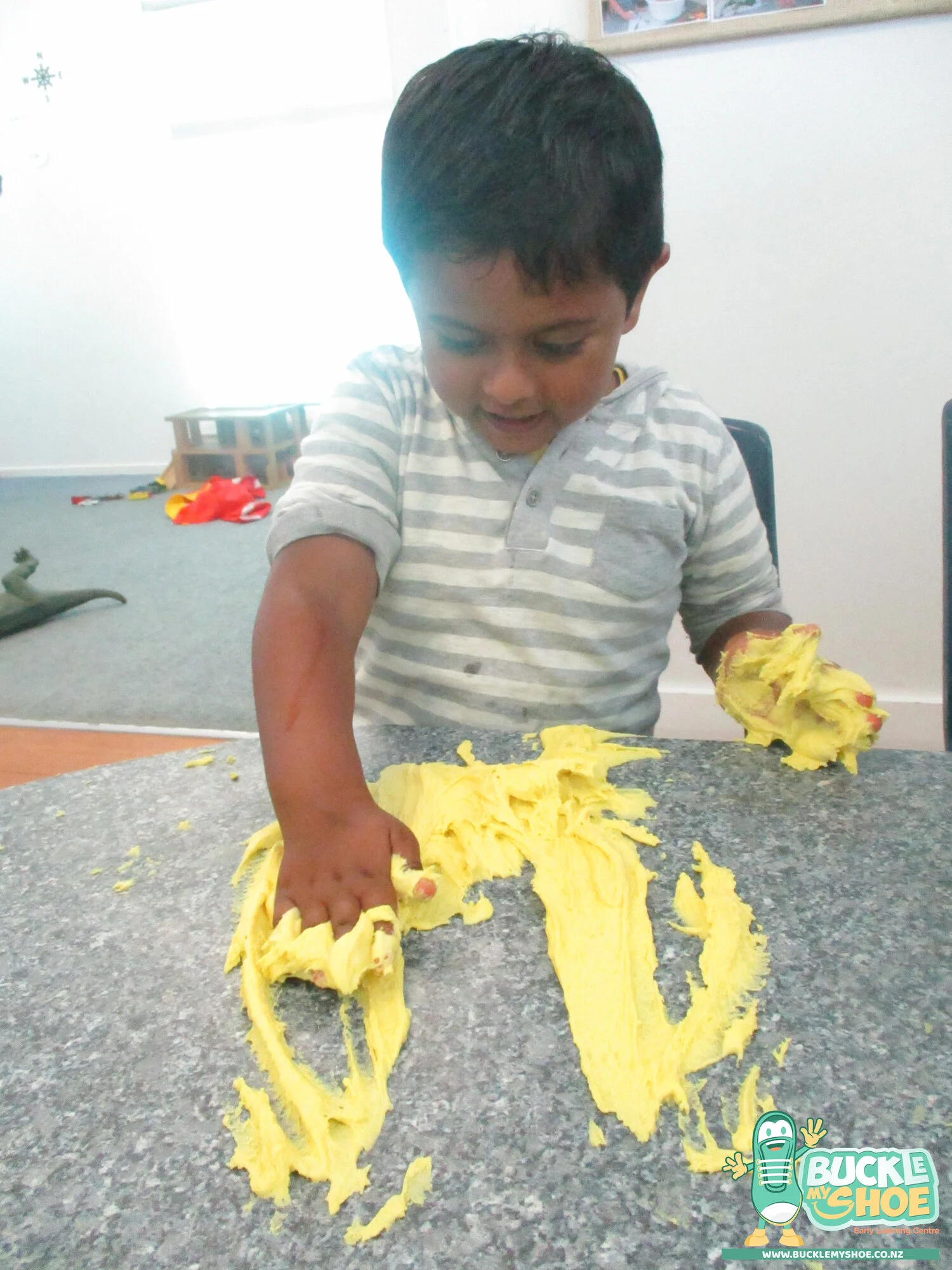 buckle-my-shoe-childcare-tauranga-yellow-sensory-play-6.jpg