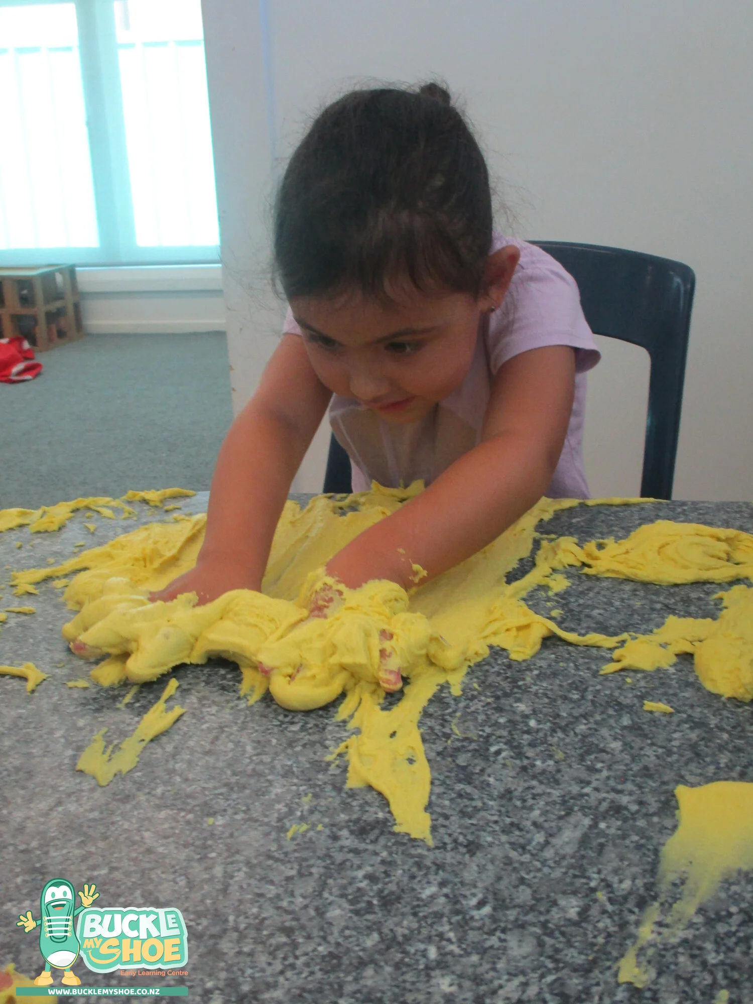 buckle-my-shoe-childcare-tauranga-yellow-sensory-play-15.jpg