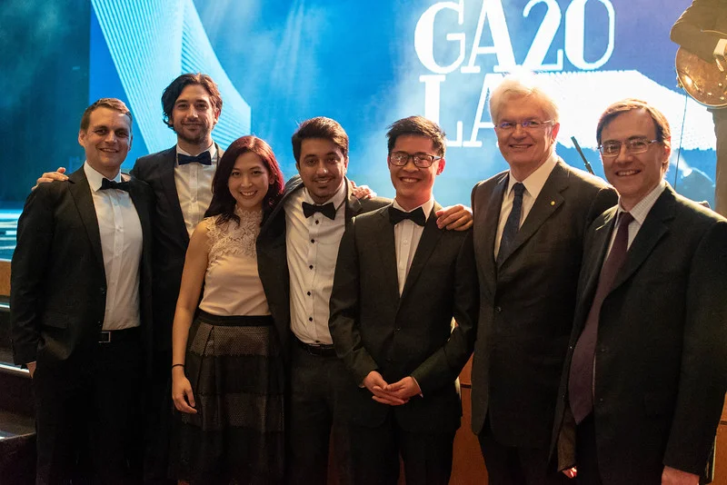 Team Navi celebrating at the Melbourne Entrepreneurship Gala with University of Melbourne VC Glyn Davies. Pictured from left to right: Alex Newton, Brad Bergmann, Wei Sue, Mubin Yousuf, Shing Sheung, Glyn Davis, Prof. David Grayden