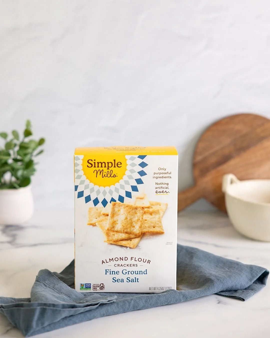 For this spec shoot, I created a variety of setups to showcase my versatility as a commercial product photographer, including colorful backdrop shots, styled kitchen scenes, and a snacking together concept with a mother and child. By blending these p