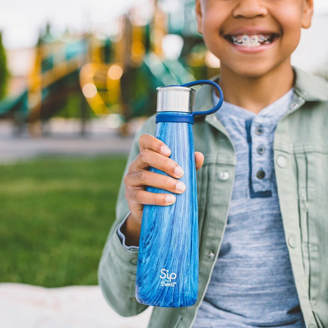For this product photoshoot for S'well, I used a local playground to set a relatable scene for the kid-centric products, using diverse models to fulfill the brand's primary request. I used simple props like a picnic blanket and snacks to create an au