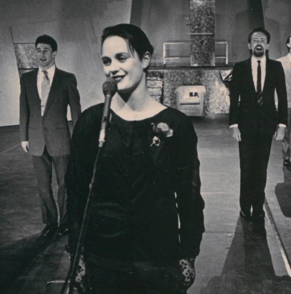 Dinosaur_Julie-Anne Long at Microphone.jpeg