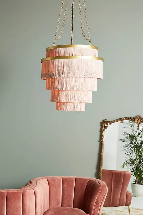 Go bold! Beautiful elegence combined with the brass. Amazing for a hallway. Aloha Fringe Chandelier @ Anthropologie £348